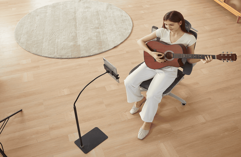 Mieux jouer de la guitare assis avec la bonne chaise